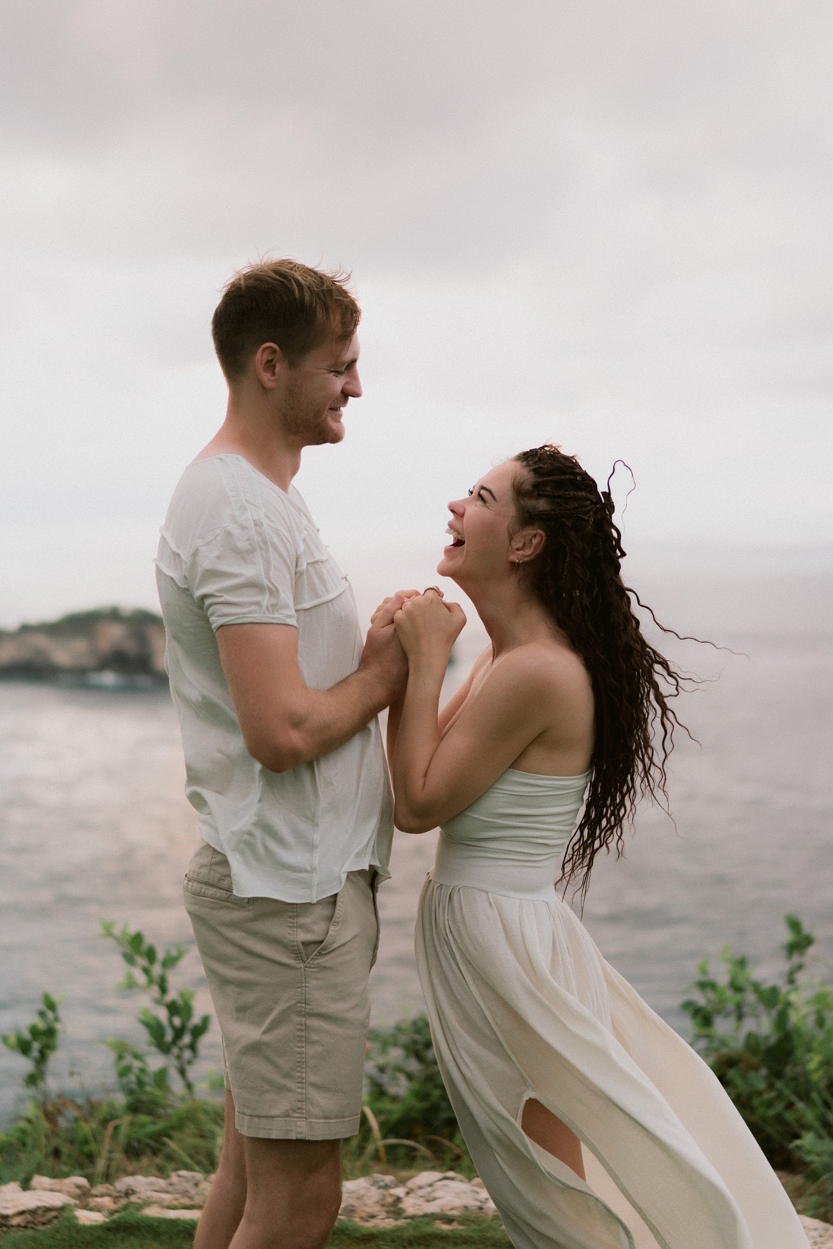 Laura and Davis in an intimate portrait against the sky
